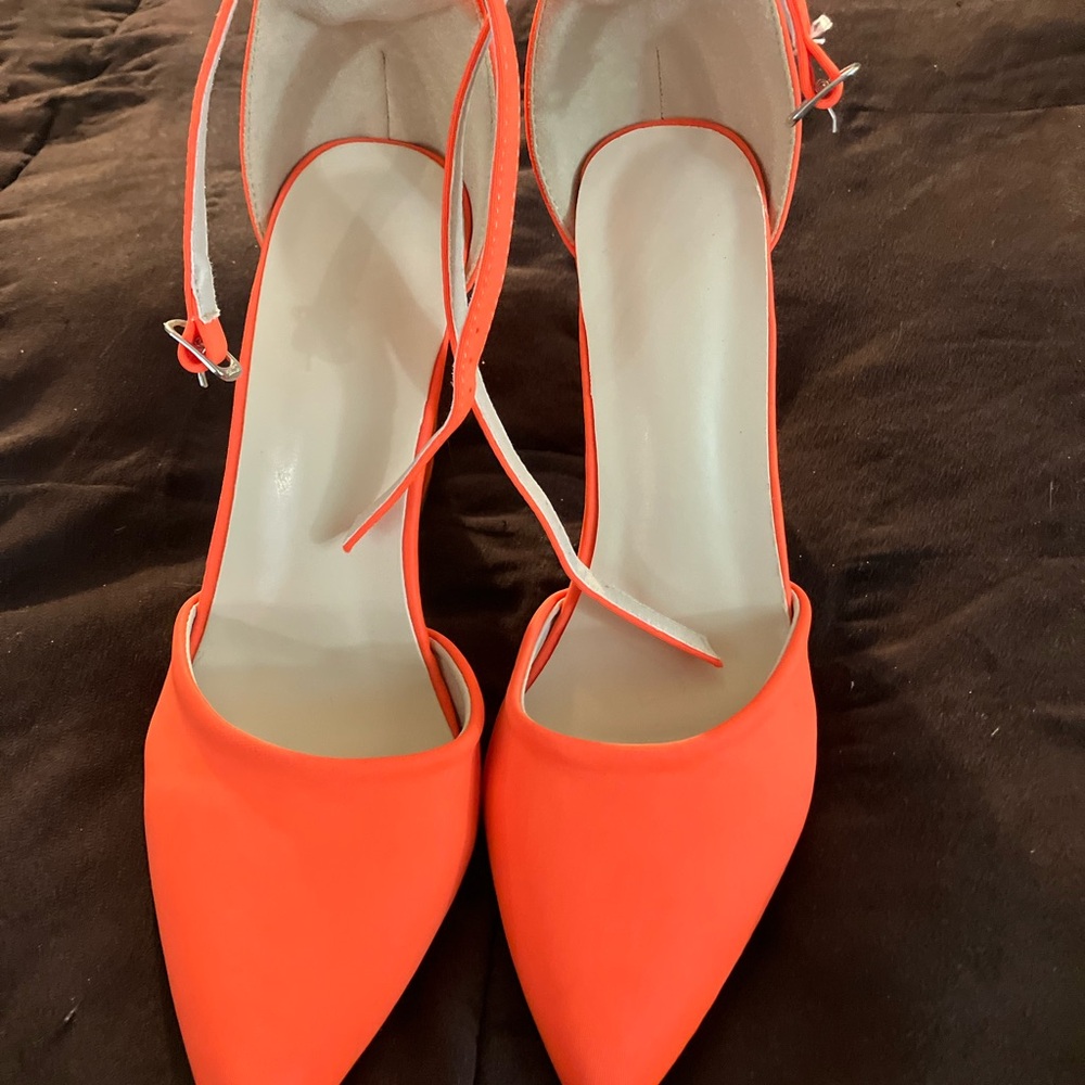 Neon Orange heels with ankle strap. Size EU 39. Great condition.